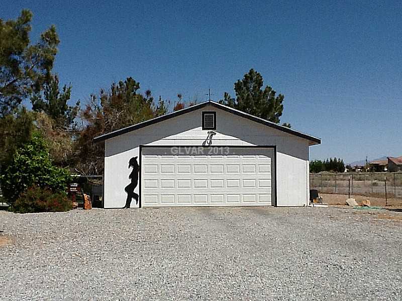 3361 South Blagg Road Pahrump, NV 89048 - Photo 3 of 27 Parking Lot. 2-car detached garage w/door opener