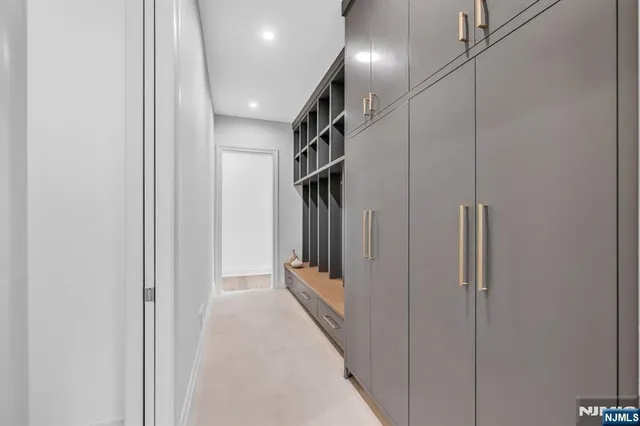 a utility room with sink dryer and washer