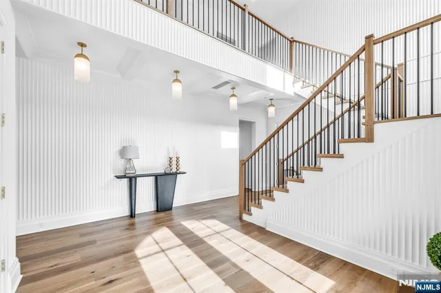 a view of a dining room with furniture and window