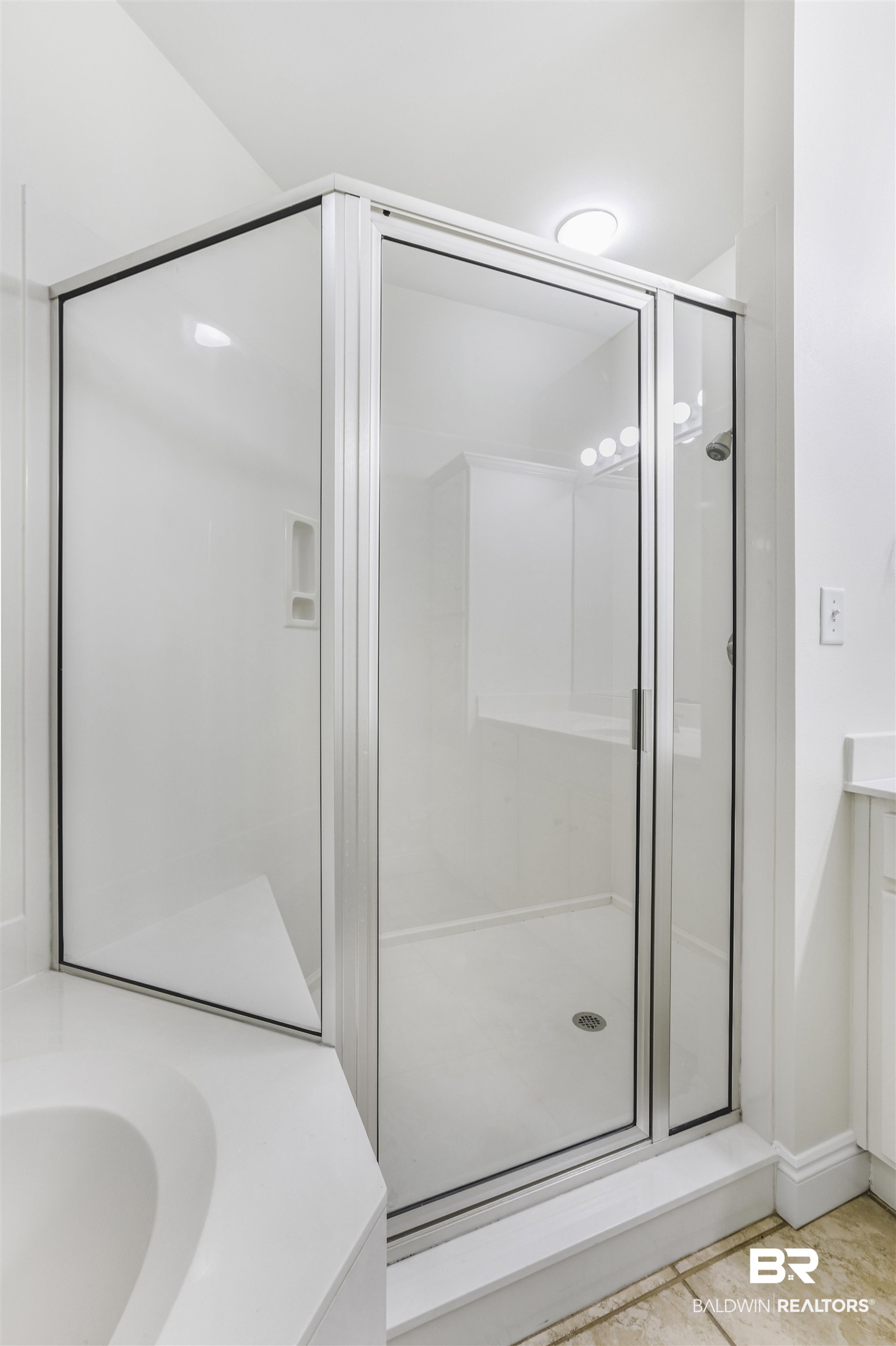 28250 Canal Road, Unit 106 Orange Beach, AL 36561 - Photo 22 of 50 Full bath featuring vanity and a stall shower