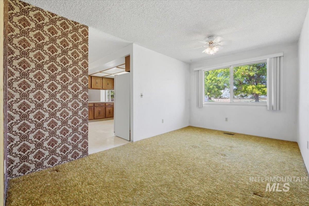 1311 North Middleton Road Nampa, ID 83651 - Photo 33 of 49 Spacious room featuring broadloom carpeting and a large window