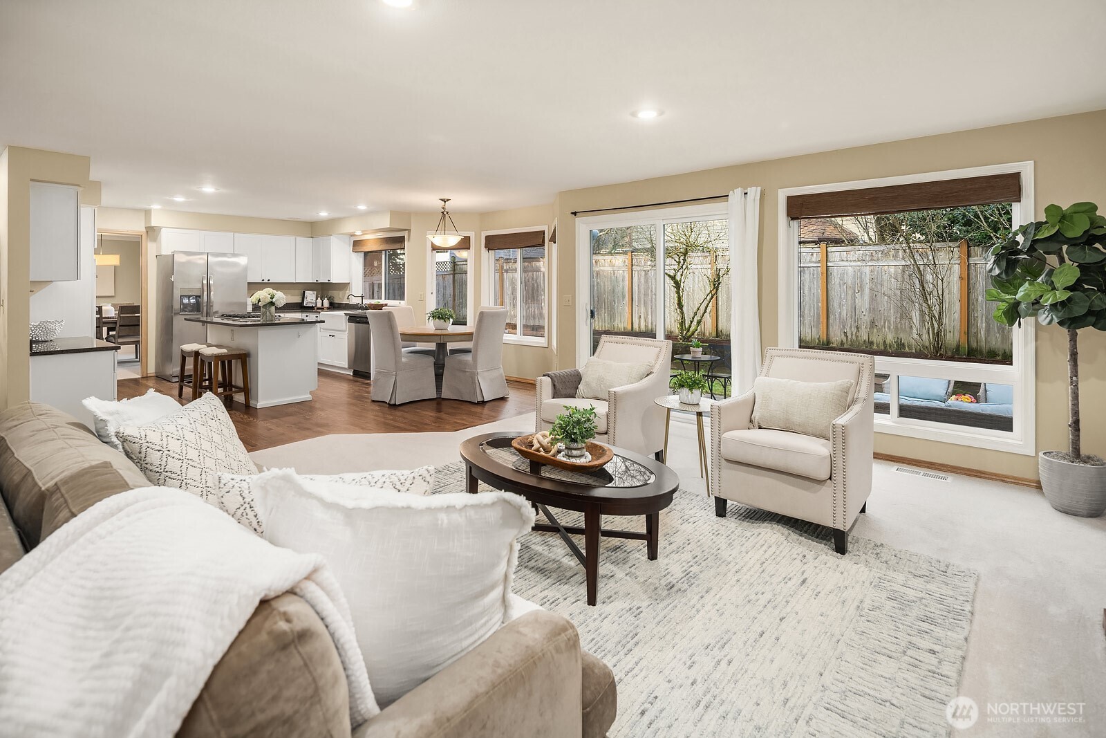 4662 244th Place Southeast Issaquah, WA 98029 - Photo 11 of 40 a living room with furniture and a large window
