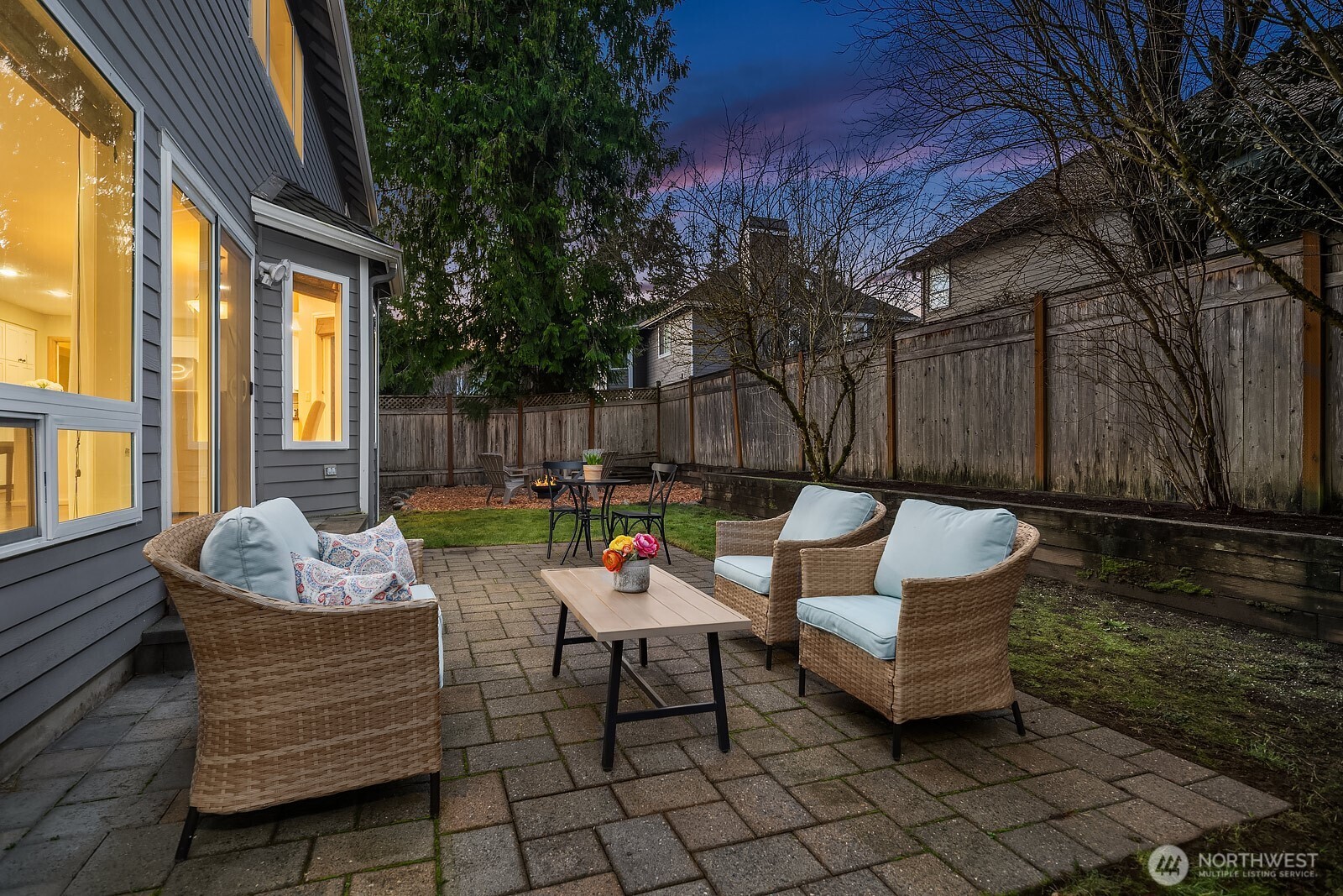 4662 244th Place Southeast Issaquah, WA 98029 - Photo 32 of 40 a outdoor space with patio couches and a potted plant on a table