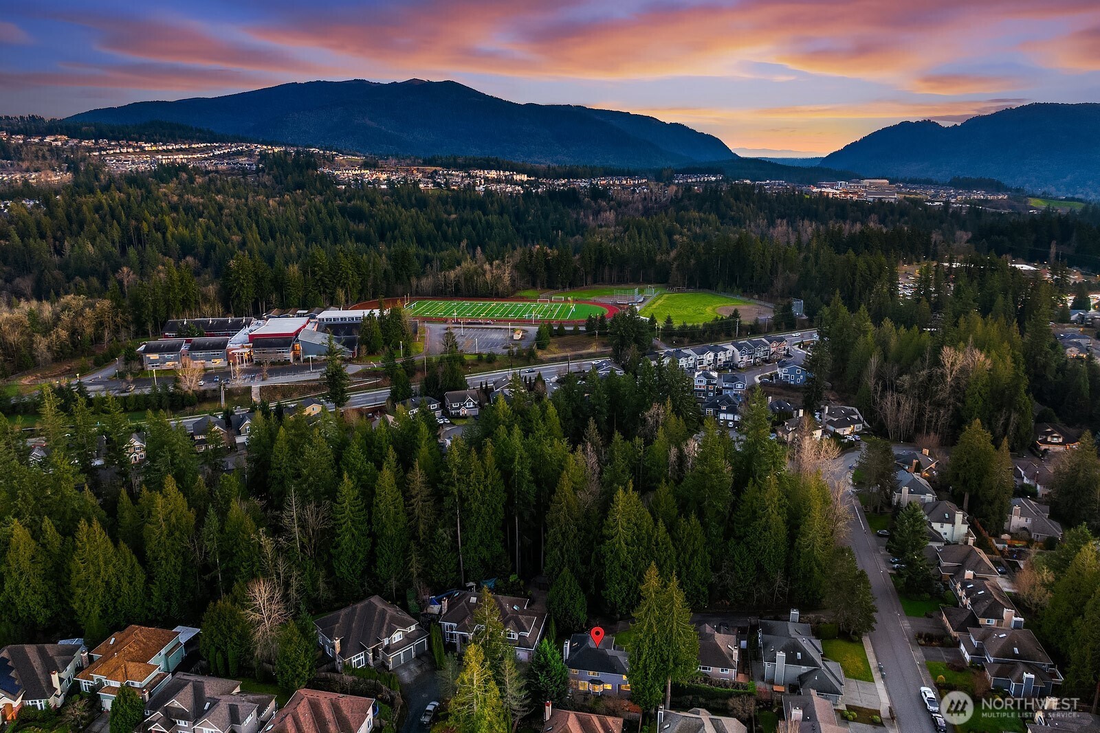 4662 244th Place Southeast Issaquah, WA 98029 - Photo 38 of 40 a view of a lake with a mountain in the background