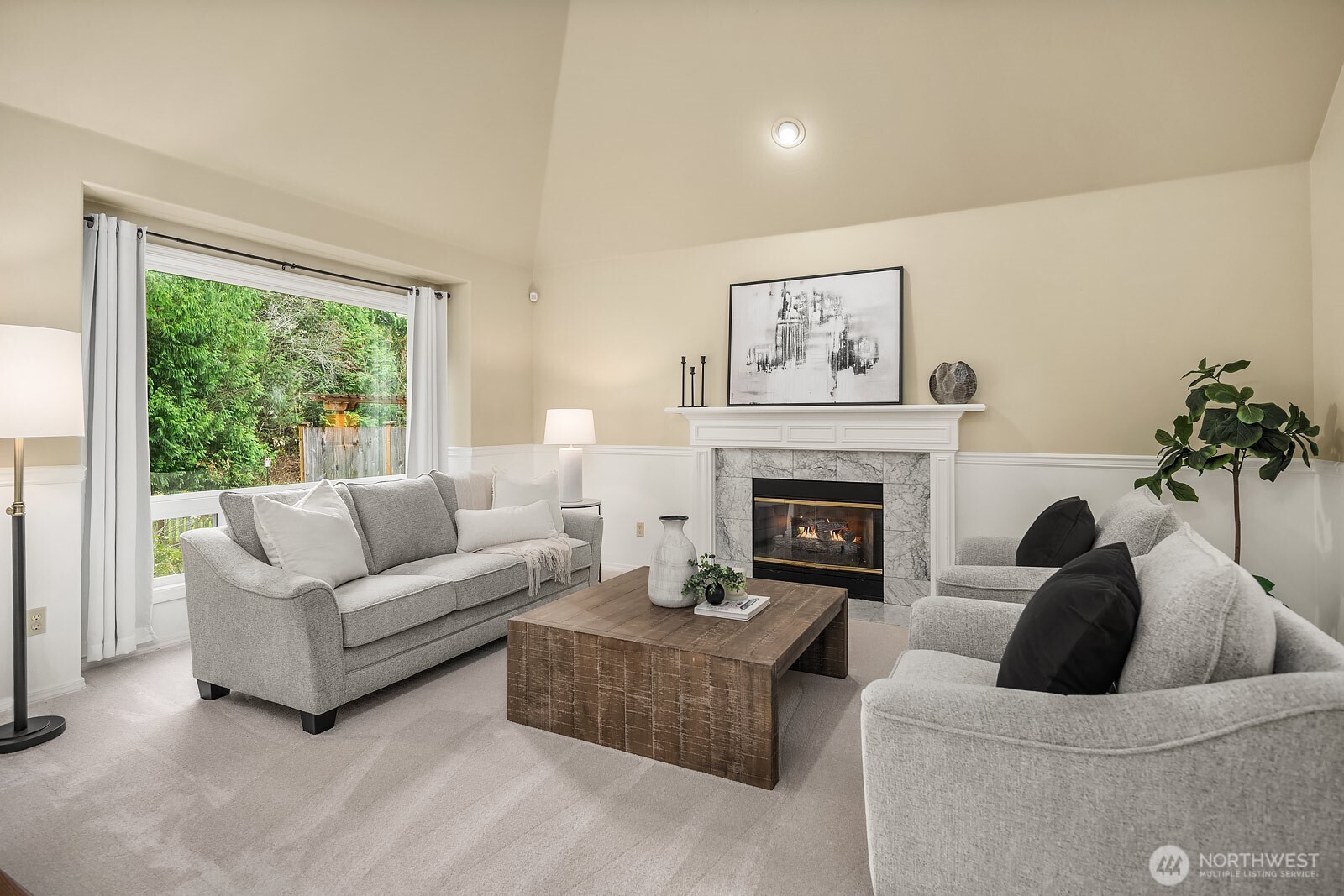 4662 244th Place Southeast Issaquah, WA 98029 - Photo 5 of 40 a living room with furniture and a fireplace