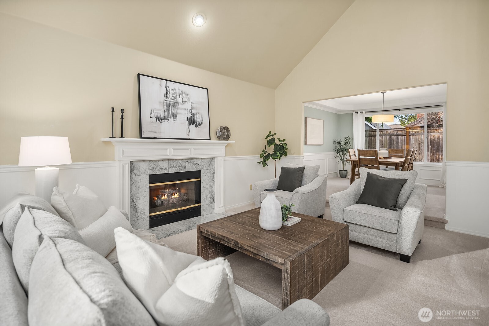 4662 244th Place Southeast Issaquah, WA 98029 - Photo 6 of 40 a living room with furniture and a fireplace