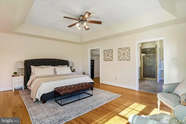 a work room with furniture and wooden floor