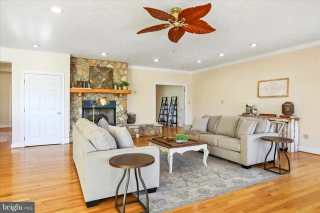 a kitchen with stainless steel appliances granite countertop a refrigerator a stove a sink dishwasher and a oven with the cabinets