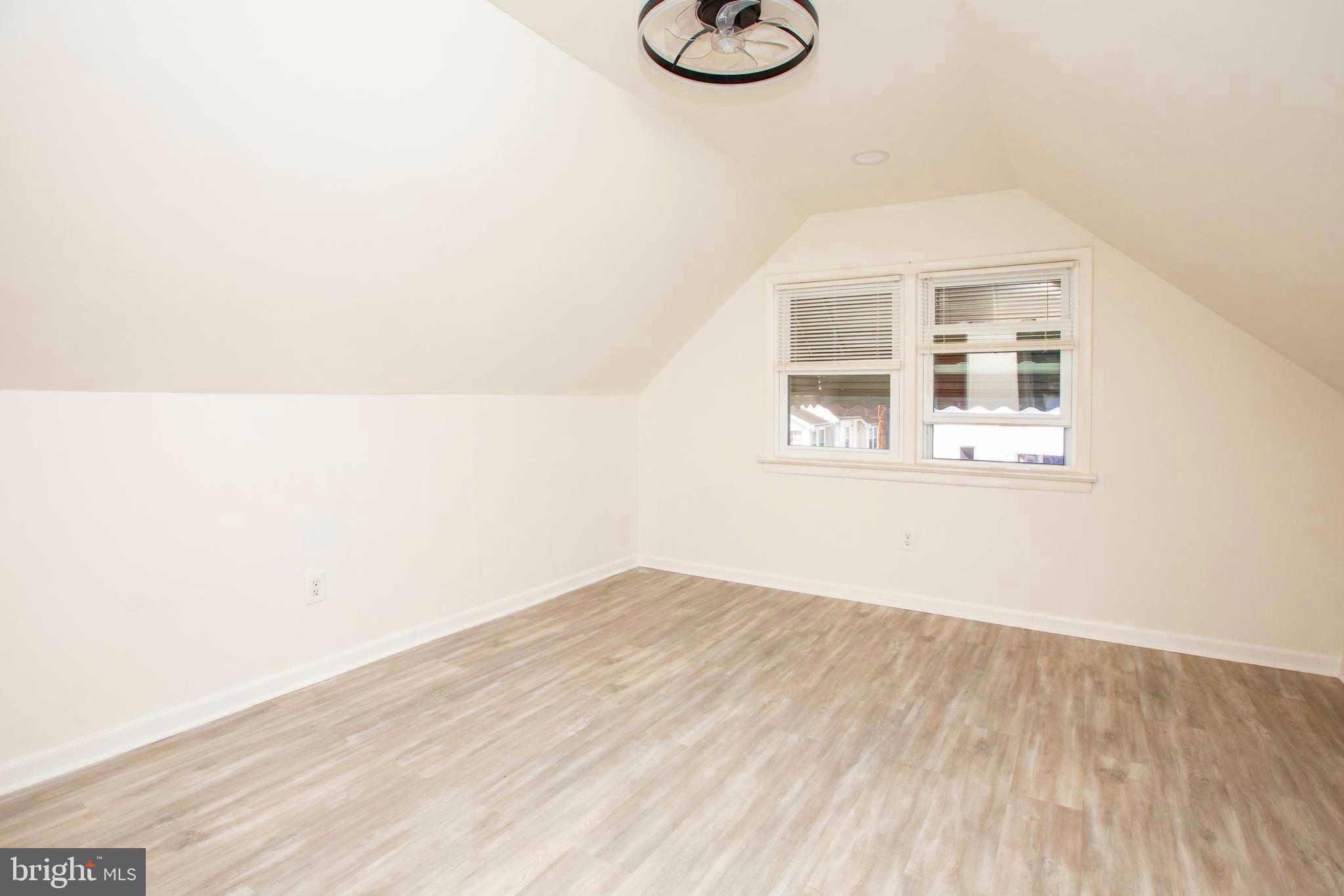 130 Reed Avenue Hamilton, NJ 08610 - Photo 23 of 29 a view of a room with wooden floor and white walls