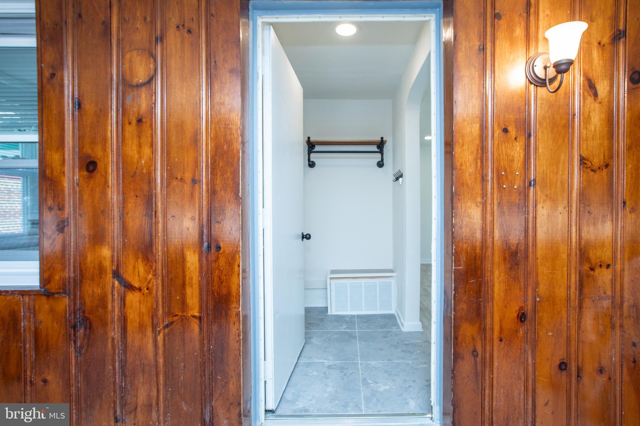 130 Reed Avenue Hamilton, NJ 08610 - Photo 5 of 29 a view of a bathroom with a shower and a door