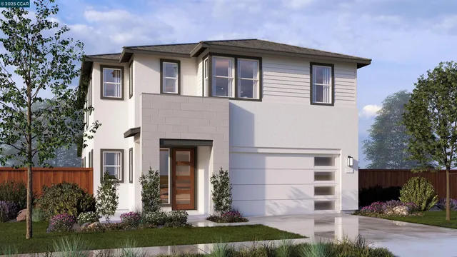a front view of a house with a yard garage and outdoor seating