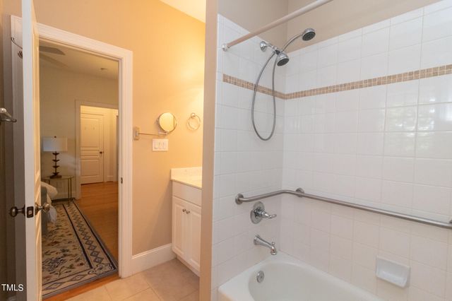 a bathroom with a sink and vanity