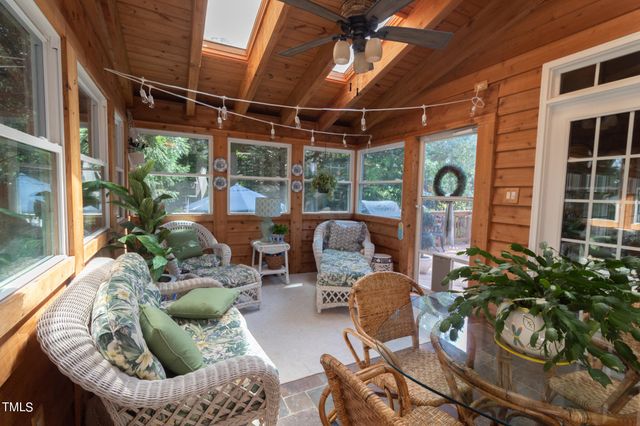 a outdoor living space with furniture and garden view