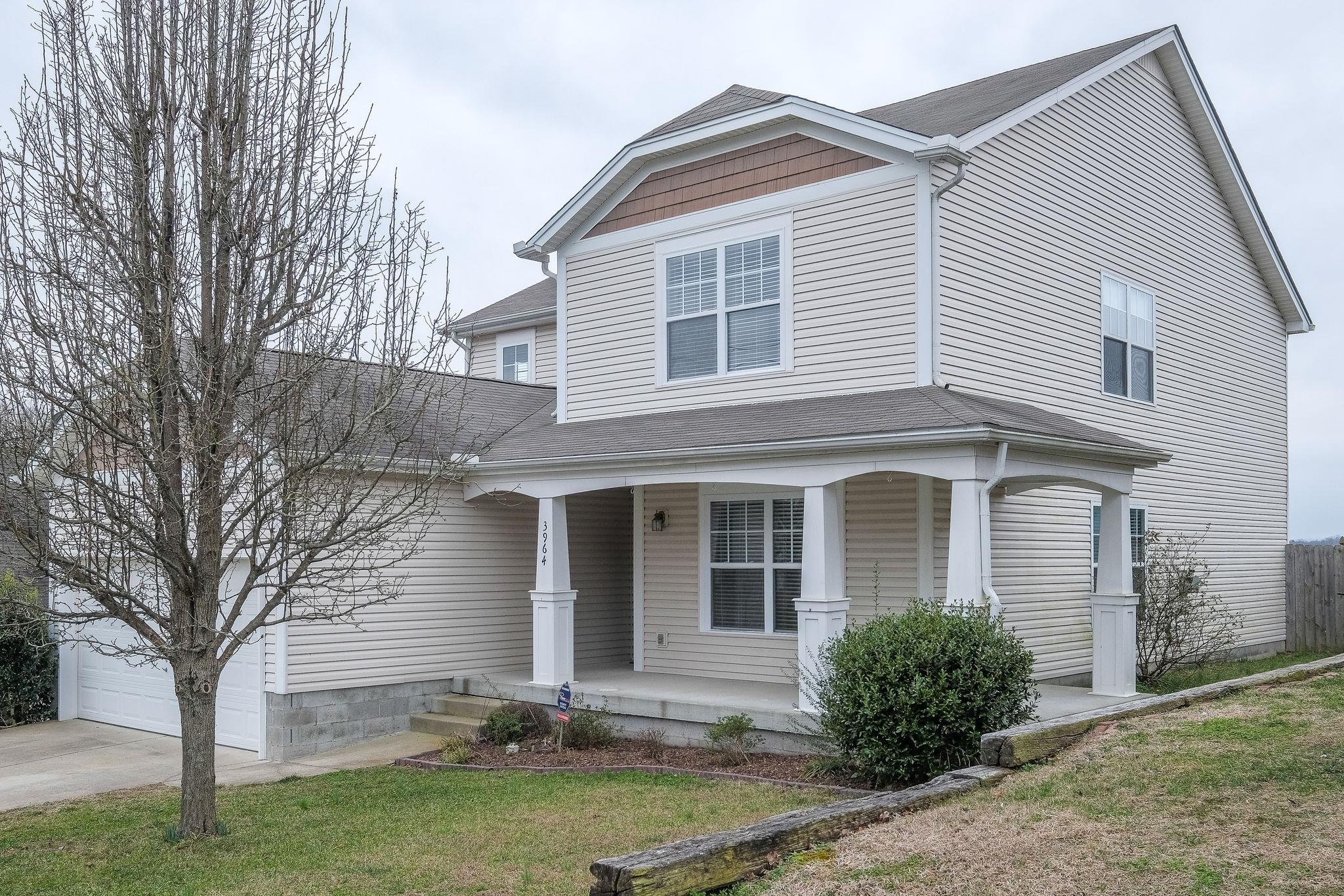 3964 Stephens Ridge Way Antioch, TN 37013 - Photo 3 of 29 a front view of a house with garden