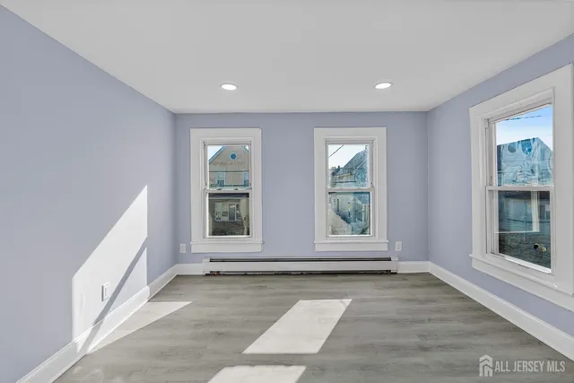 an empty room with windows