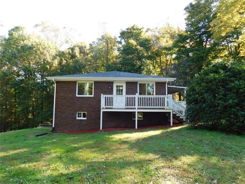 820 Muir Road Ligonier, PA 15658 - Photo 23 of 24 Side of home showing deck.