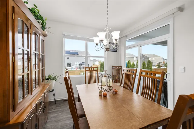 a view of a dining room with furniture window and outside view