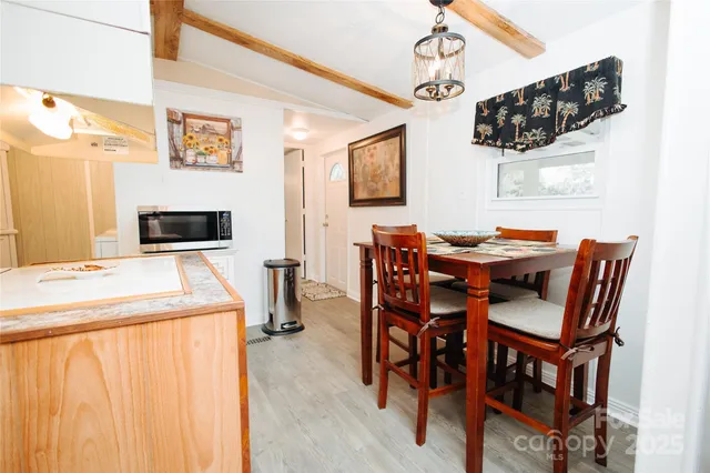 a view of kitchen and windows