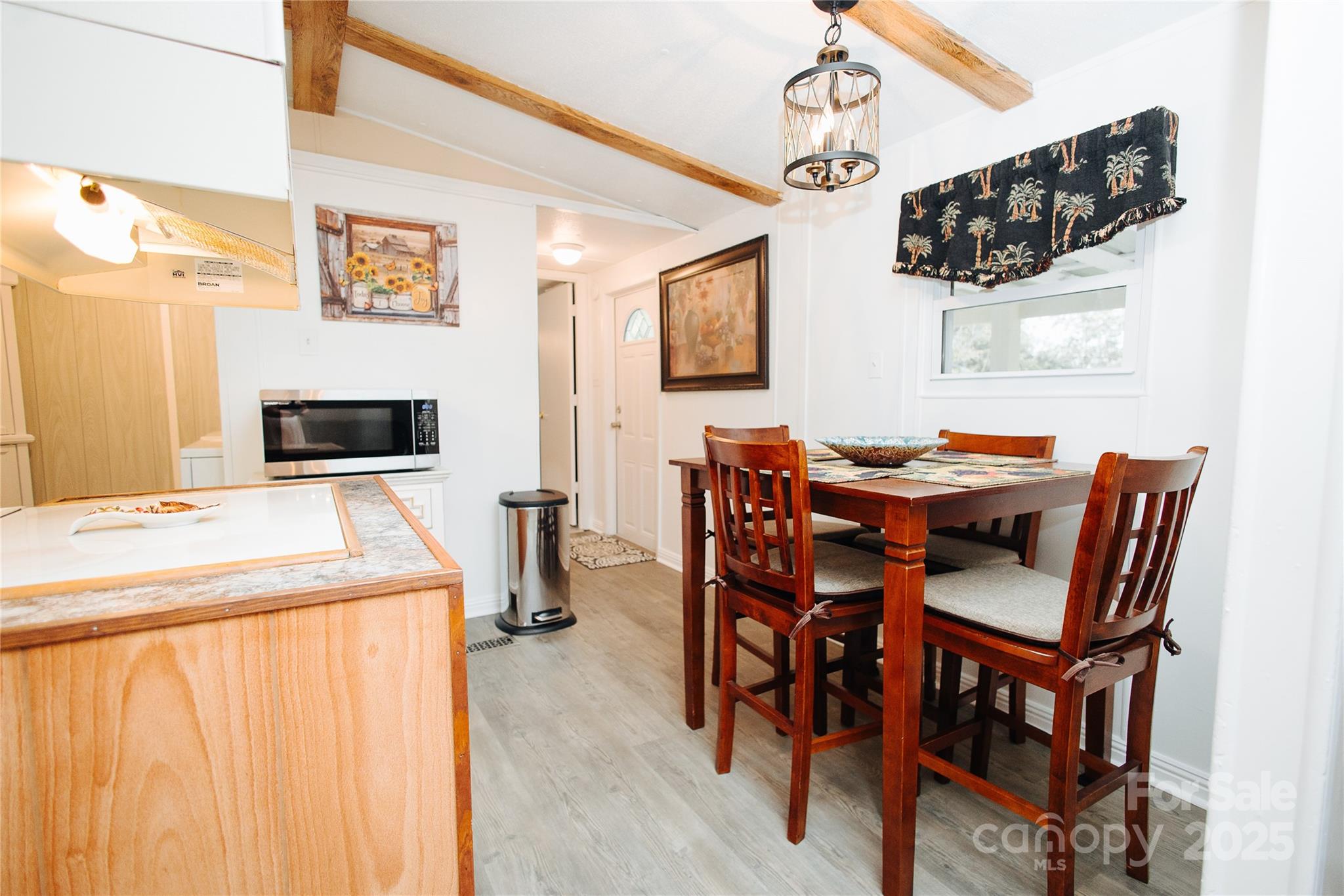 325 Griggs Road Old Fort, NC 28762 - Photo 25 of 36 a dining room with furniture and window
