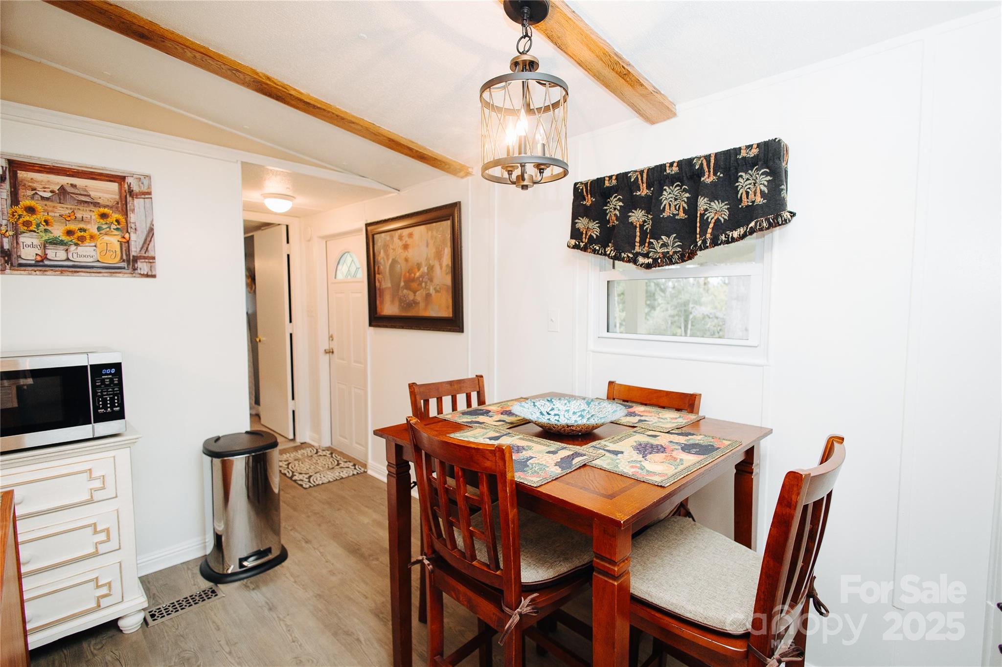325 Griggs Road Old Fort, NC 28762 - Photo 29 of 36 a dining room with furniture and wooden floor