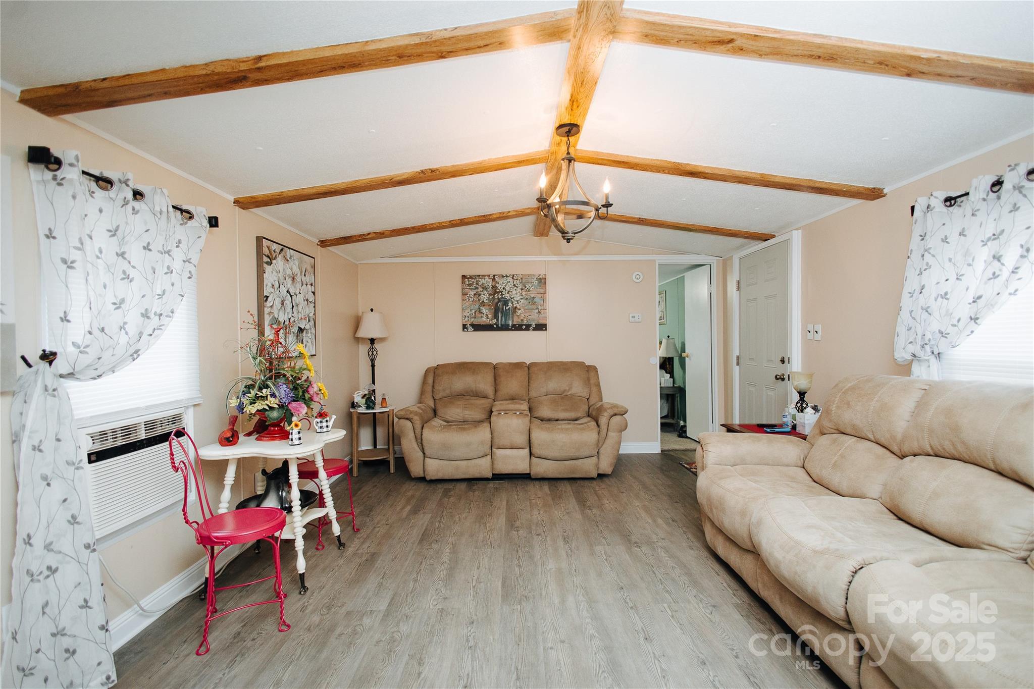 325 Griggs Road Old Fort, NC 28762 - Photo 30 of 36 a bedroom with furniture and a wooden floor
