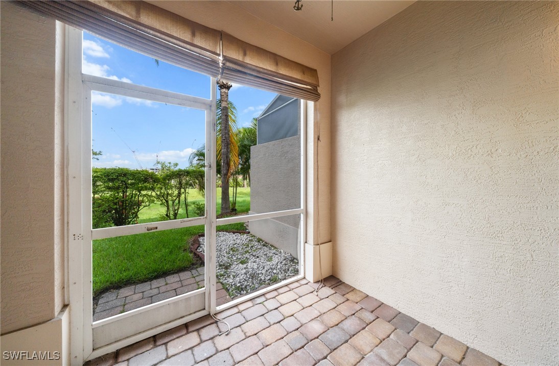 3844 Cherrybrook Loop Fort Myers, FL 33966 - Photo 22 of 29 a view of a glass door and a window