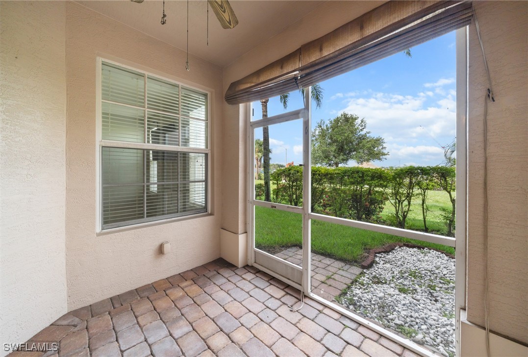 3844 Cherrybrook Loop Fort Myers, FL 33966 - Photo 23 of 29 a view of house with a large window and front door