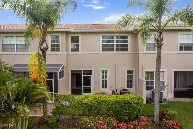 a view of a building with a garden