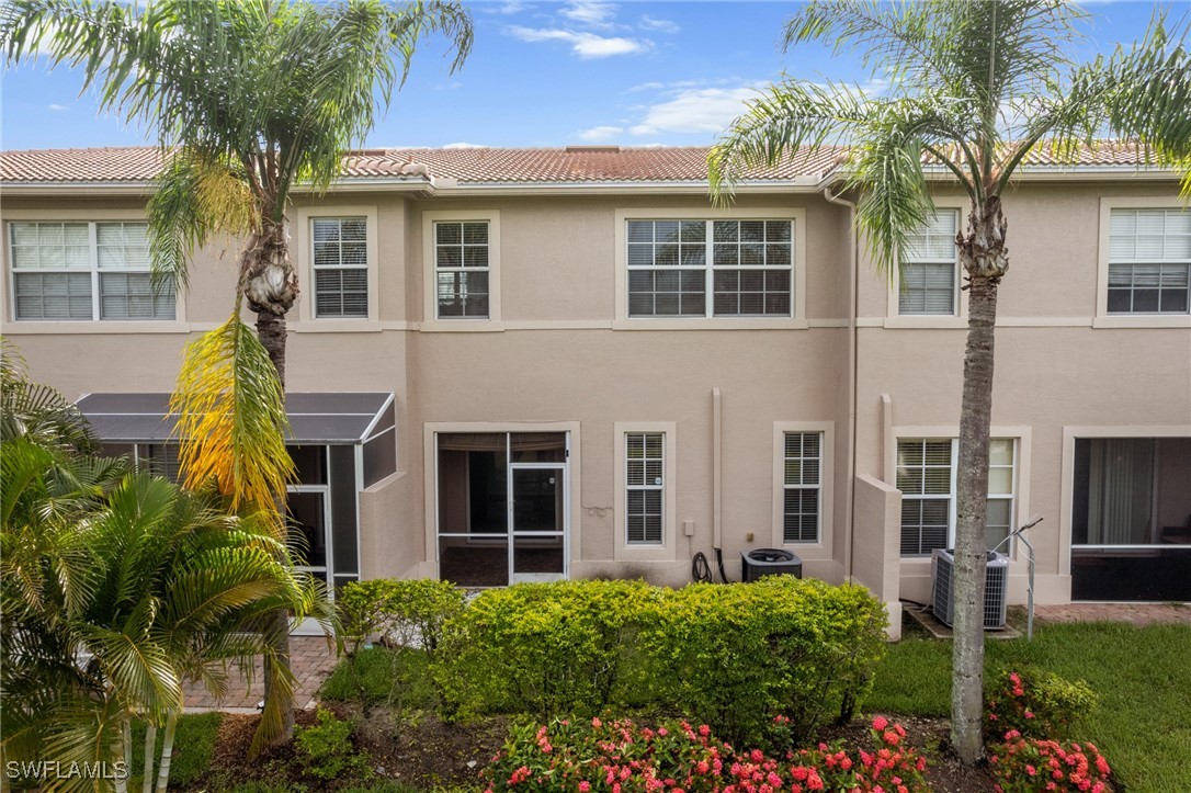 3844 Cherrybrook Loop Fort Myers, FL 33966 - Photo 27 of 29 a view of a building with a garden