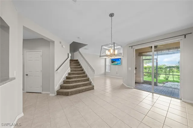 a view of entryway and hall with a window