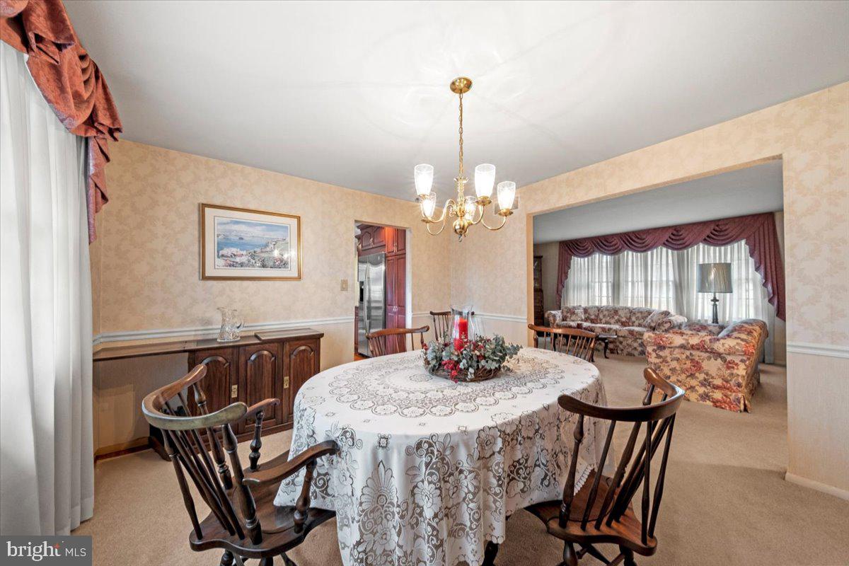 5 Everington Road Marlton, NJ 08053 - Photo 13 of 45 a view of a dining room with furniture window and wooden floor