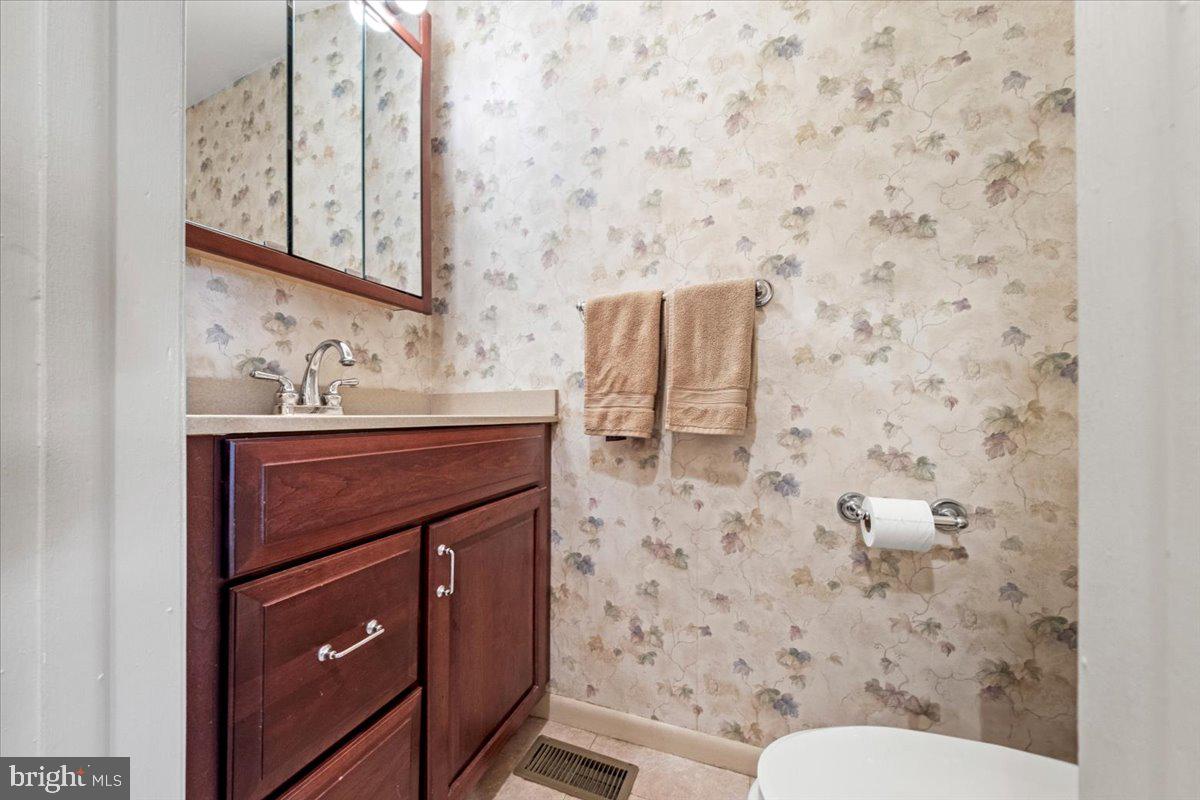 5 Everington Road Marlton, NJ 08053 - Photo 25 of 45 a bathroom with a sink toilet and mirror