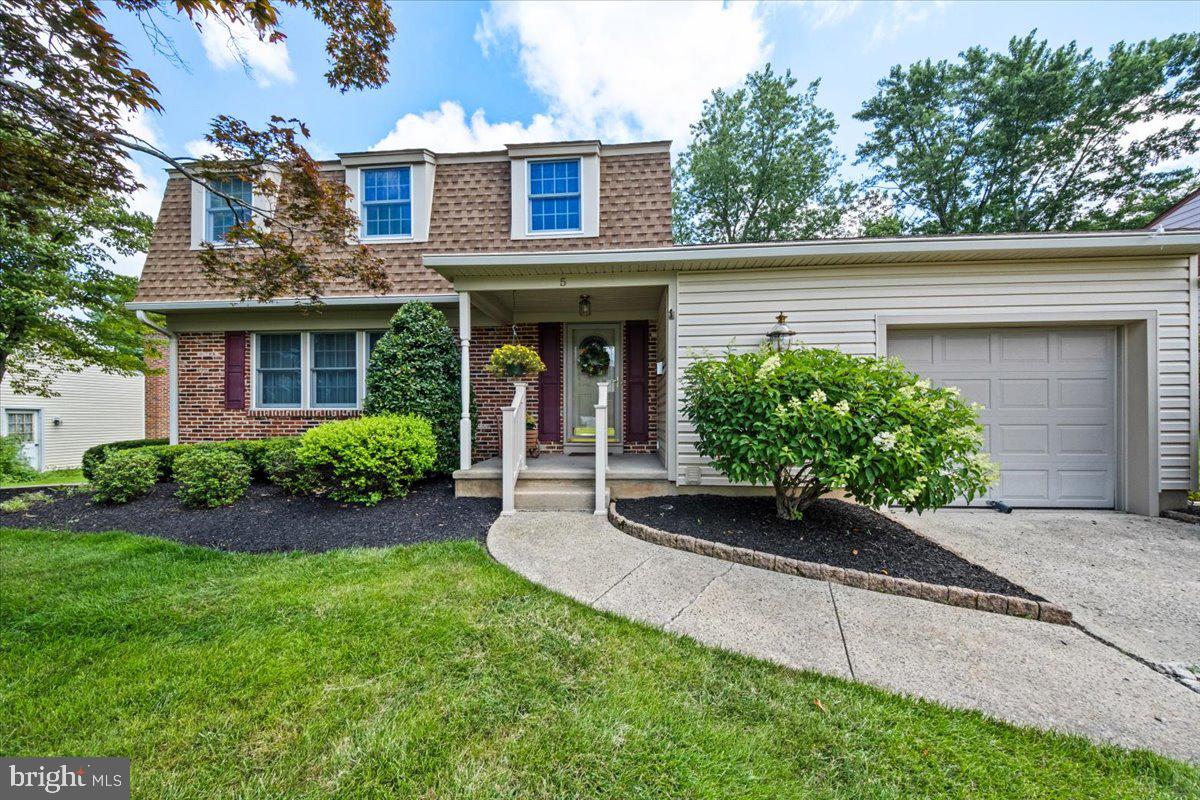 5 Everington Road Marlton, NJ 08053 - Photo 5 of 45 front view of a house with a yard and potted plants