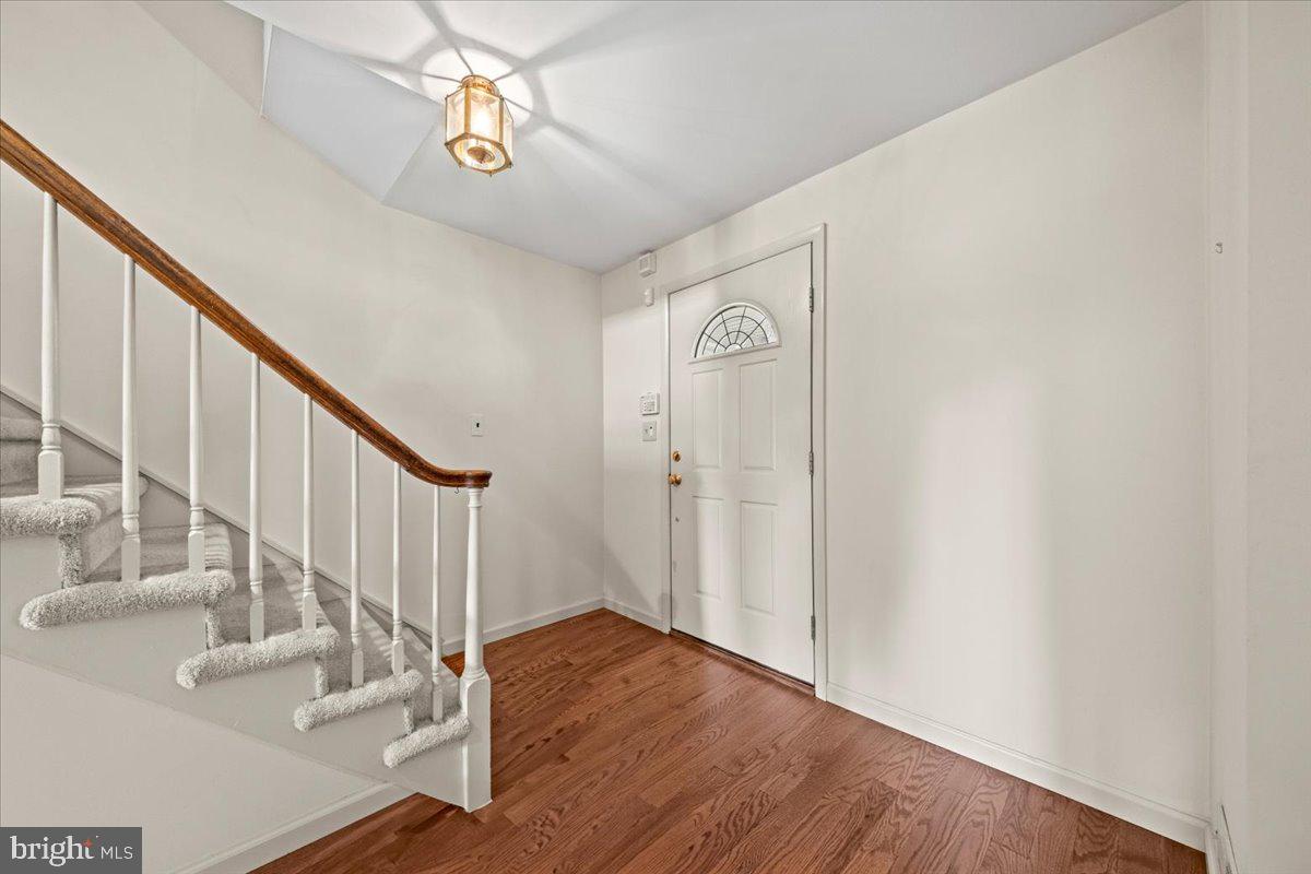 5 Everington Road Marlton, NJ 08053 - Photo 7 of 45 a view of staircase with wooden floor and window