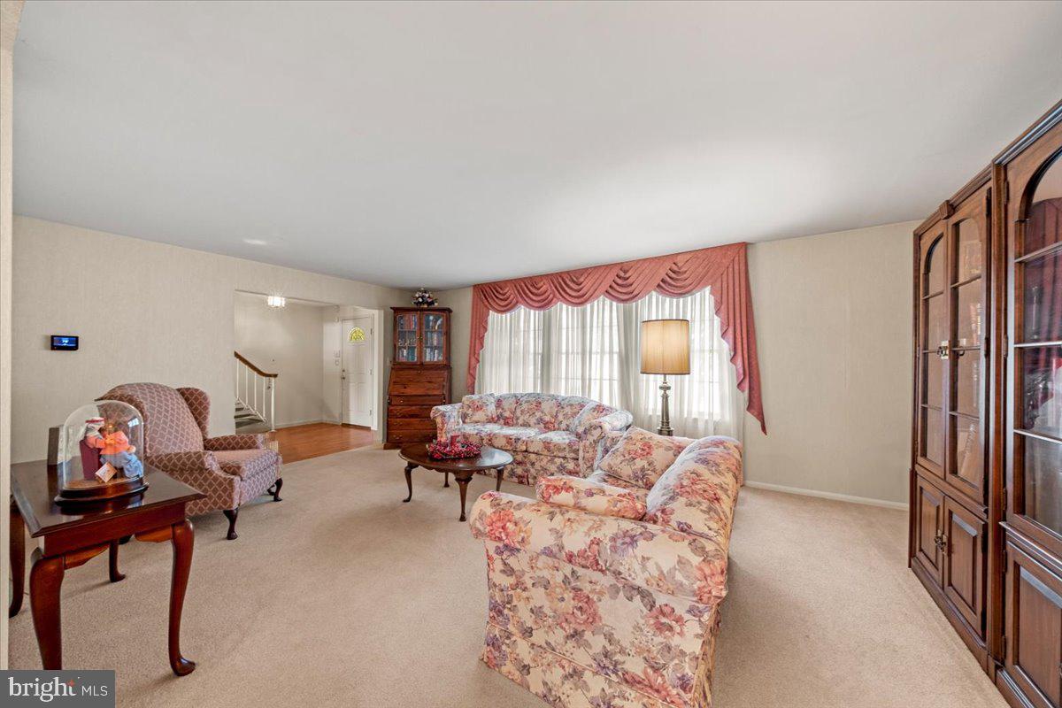 5 Everington Road Marlton, NJ 08053 - Photo 10 of 45 a living room with furniture a window and a flat screen tv