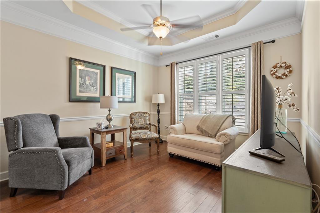 3457 Locust Cove Road Gainesville, GA 30504 - Photo 20 of 54 a living room with furniture and a flat screen tv