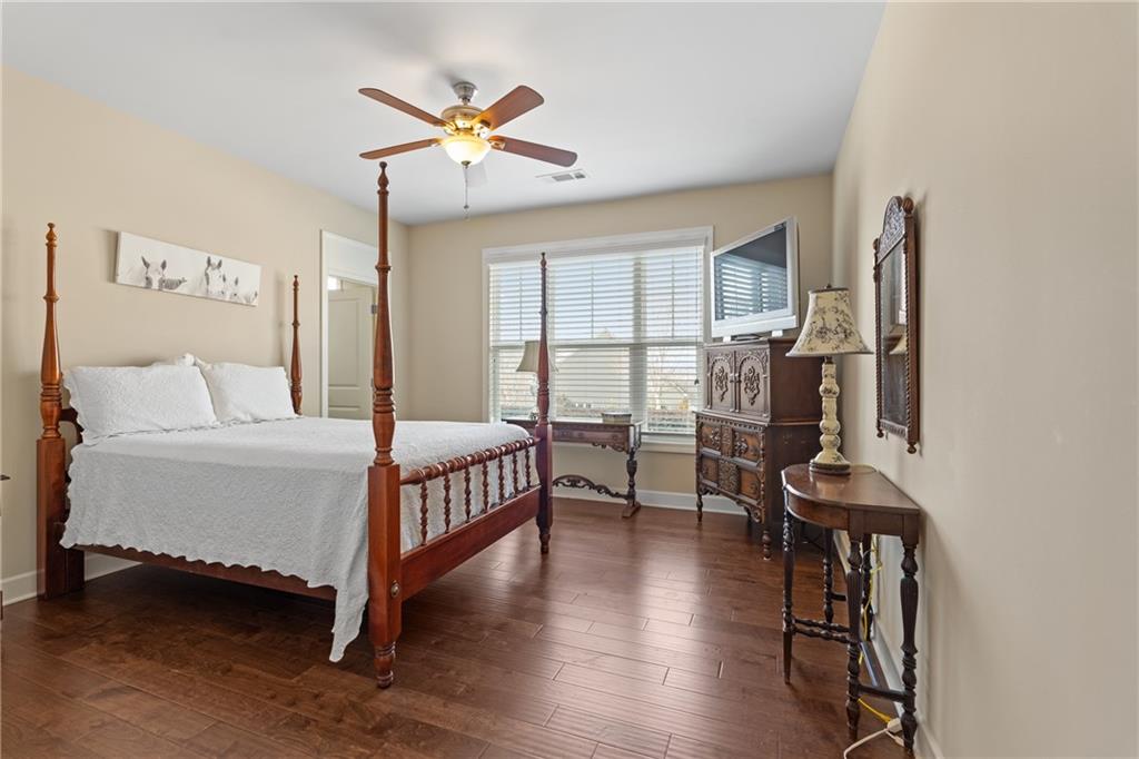 3457 Locust Cove Road Gainesville, GA 30504 - Photo 24 of 54 a bedroom with a bed furniture and a window