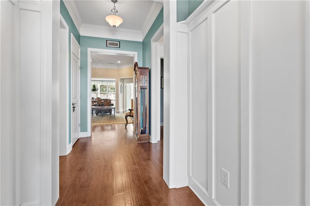 3457 Locust Cove Road Gainesville, GA 30504 - Photo 3 of 54 a view of a hallway with wooden floor windows and livingroom