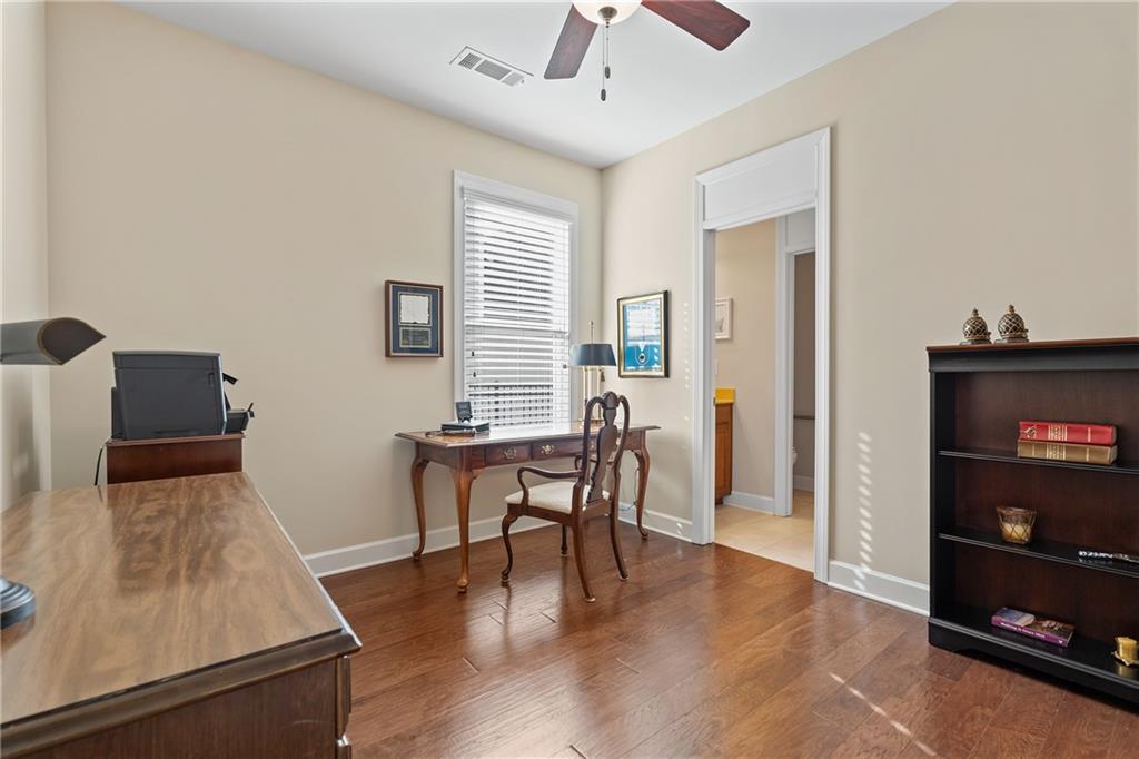 3457 Locust Cove Road Gainesville, GA 30504 - Photo 31 of 54 a view of a livingroom with furniture and a window