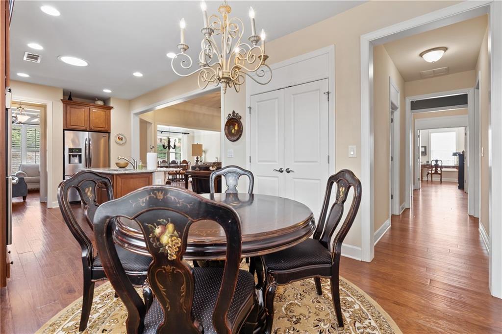 3457 Locust Cove Road Gainesville, GA 30504 - Photo 4 of 54 a view of a dining room with furniture and wooden floor