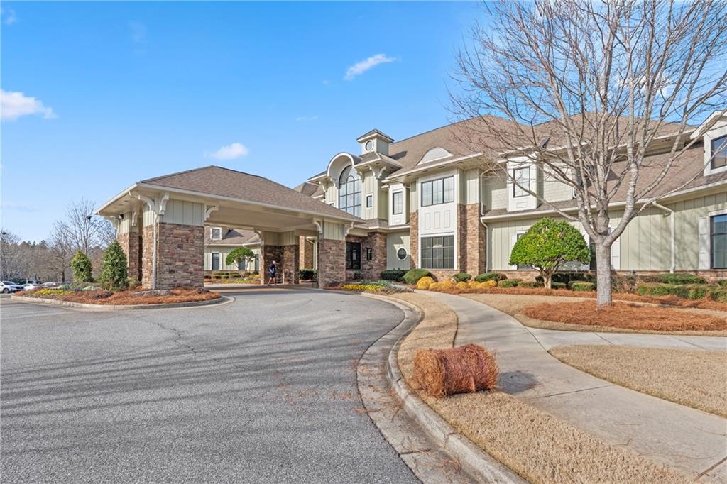 3457 Locust Cove Road Gainesville, GA 30504 - Photo 43 of 54 a front view of a house with yard and parking