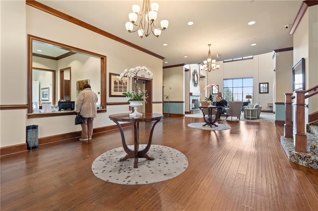 3457 Locust Cove Road Gainesville, GA 30504 - Photo 44 of 54 a living room with furniture and wooden floor