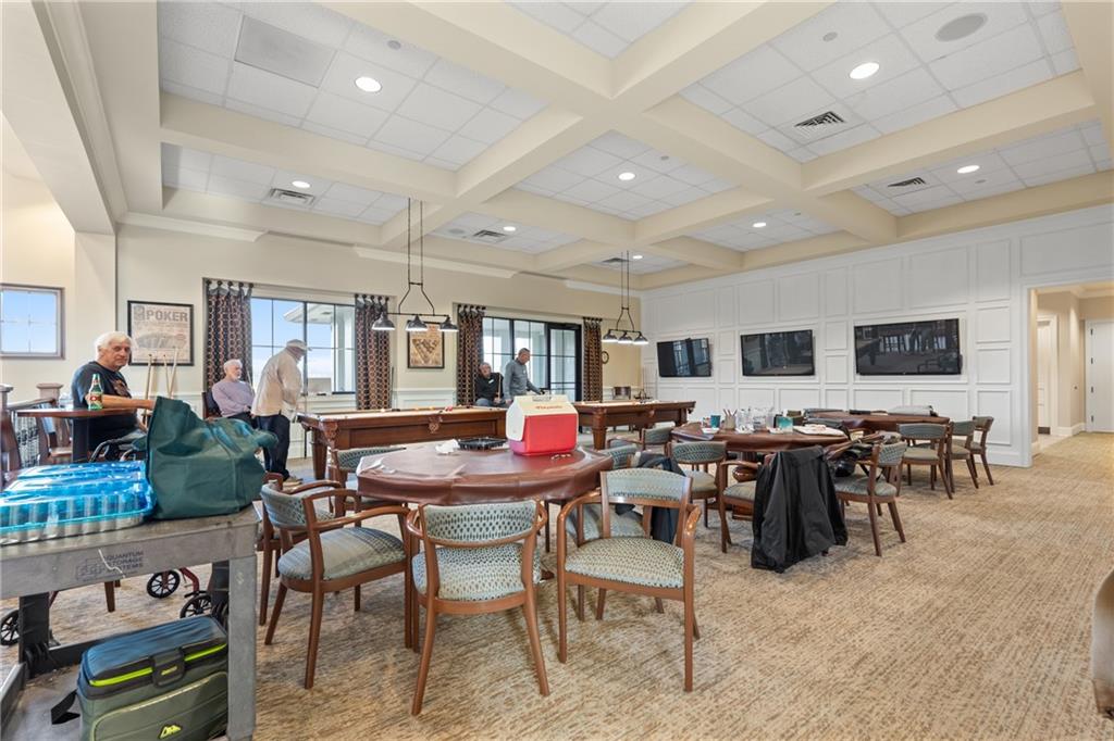 3457 Locust Cove Road Gainesville, GA 30504 - Photo 47 of 54 a group of people sitting in a living room