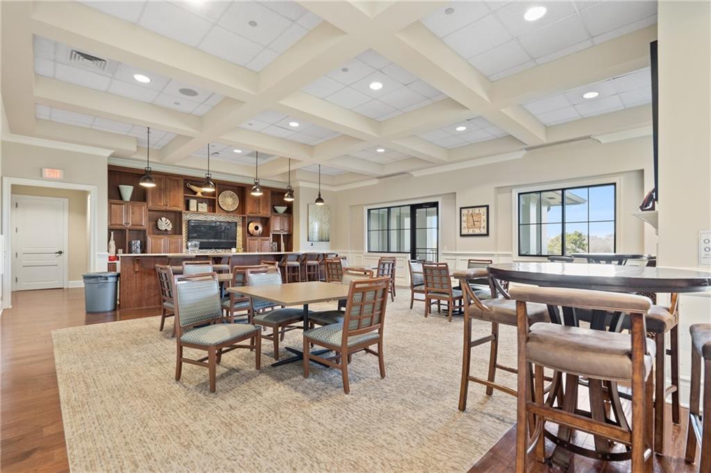 3457 Locust Cove Road Gainesville, GA 30504 - Photo 48 of 54 a living room with lots of furniture and a wooden floor