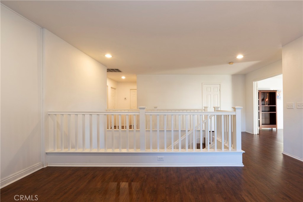 6319 Lavender Street Eastvale, CA 92880 - Photo 17 of 39 a view of entryway with wooden floor