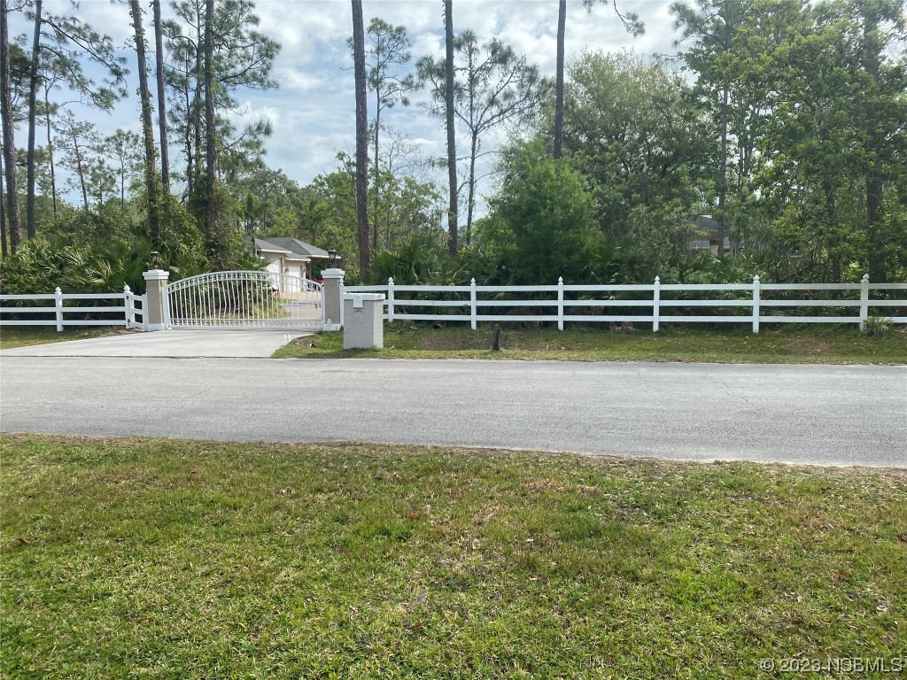 32 Winchester Road Ormond Beach, FL 32174 - Photo 9 of 84 a view of a golf course with a bench