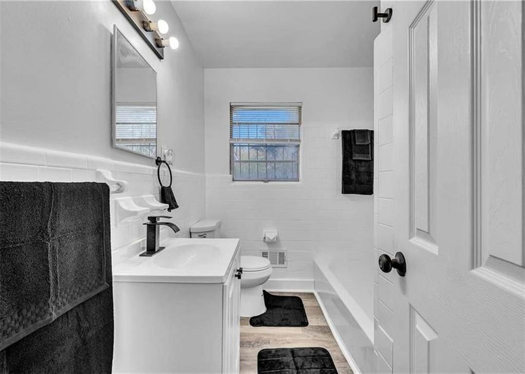 2356 County Line Road Southwest Atlanta, GA 30331 - Photo 6 of 8 a bathroom with a sink toilet and shower
