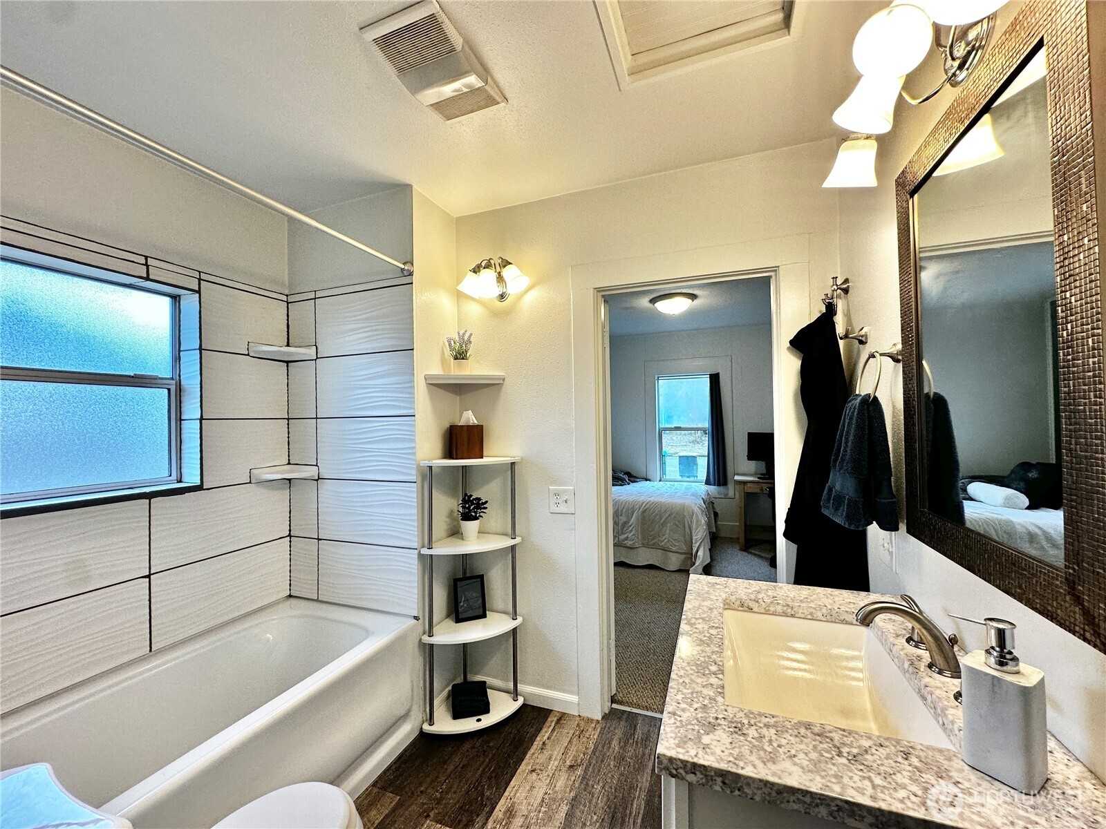 303 South Buckner Street Centralia, WA 98531 - Photo 24 of 33 a bathroom with a tub sink and toilet