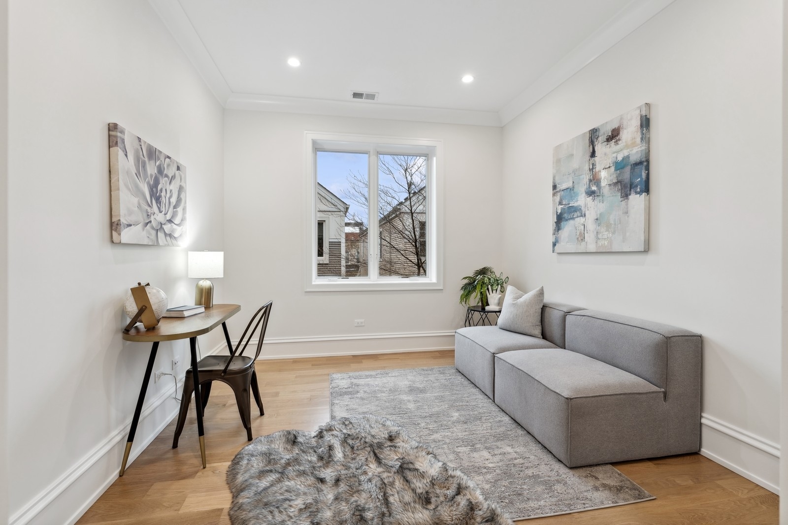 1511 West Byron Street, Unit 2 Chicago, IL 60613 - Photo 15 of 21 a living room with furniture and a rug