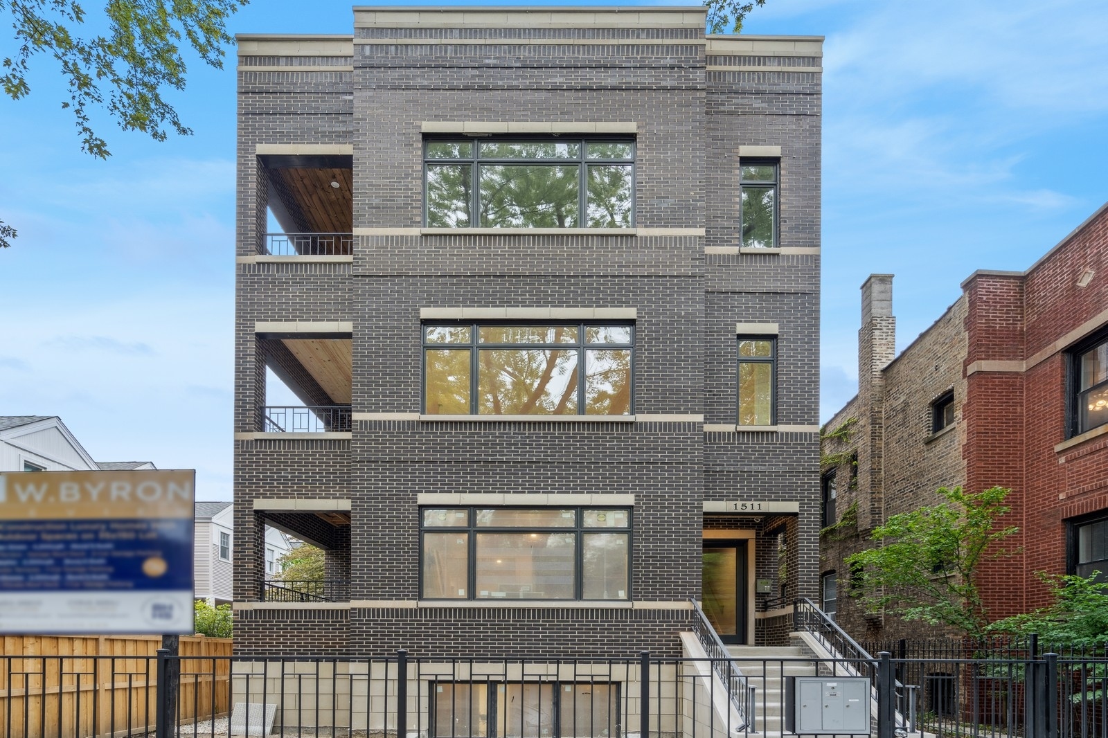 1511 West Byron Street, Unit 2 Chicago, IL 60613 - Photo 20 of 21 a front view of a house with glass windows
